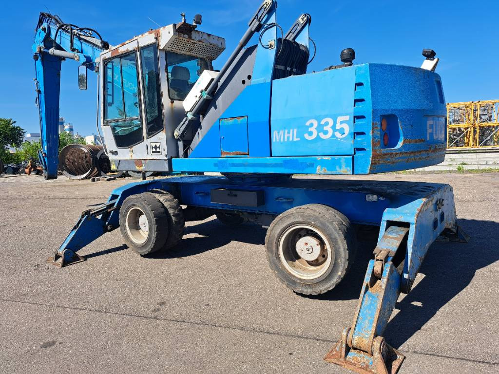 Fuchs MHL335 + Grapple + Reman Engine - Překládkové rypadlo: obrázek 1 Fuchs MHL335 + Grapple + Reman Engine - Překládkové rypadlo: obrázek 1