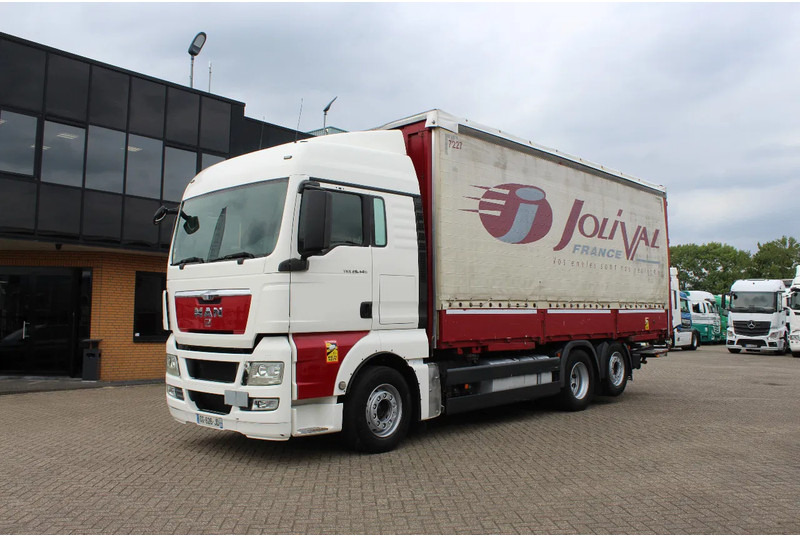 MAN TGX 26.440 * EURO5 * 6X2 * LIFT AXLE * - Plachtový nákladní auto: obrázek 1 MAN TGX 26.440 * EURO5 * 6X2 * LIFT AXLE * - Plachtový nákladní auto: obrázek 1