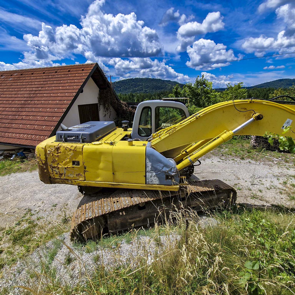 New Holland Kobelco E215 - Pásové rýpadlo: obrázek 4 New Holland Kobelco E215 - Pásové rýpadlo: obrázek 4