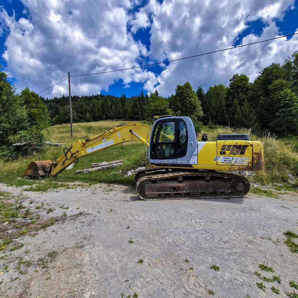 New Holland Kobelco E215 - Pásové rýpadlo: obrázek 1 New Holland Kobelco E215 - Pásové rýpadlo: obrázek 1
