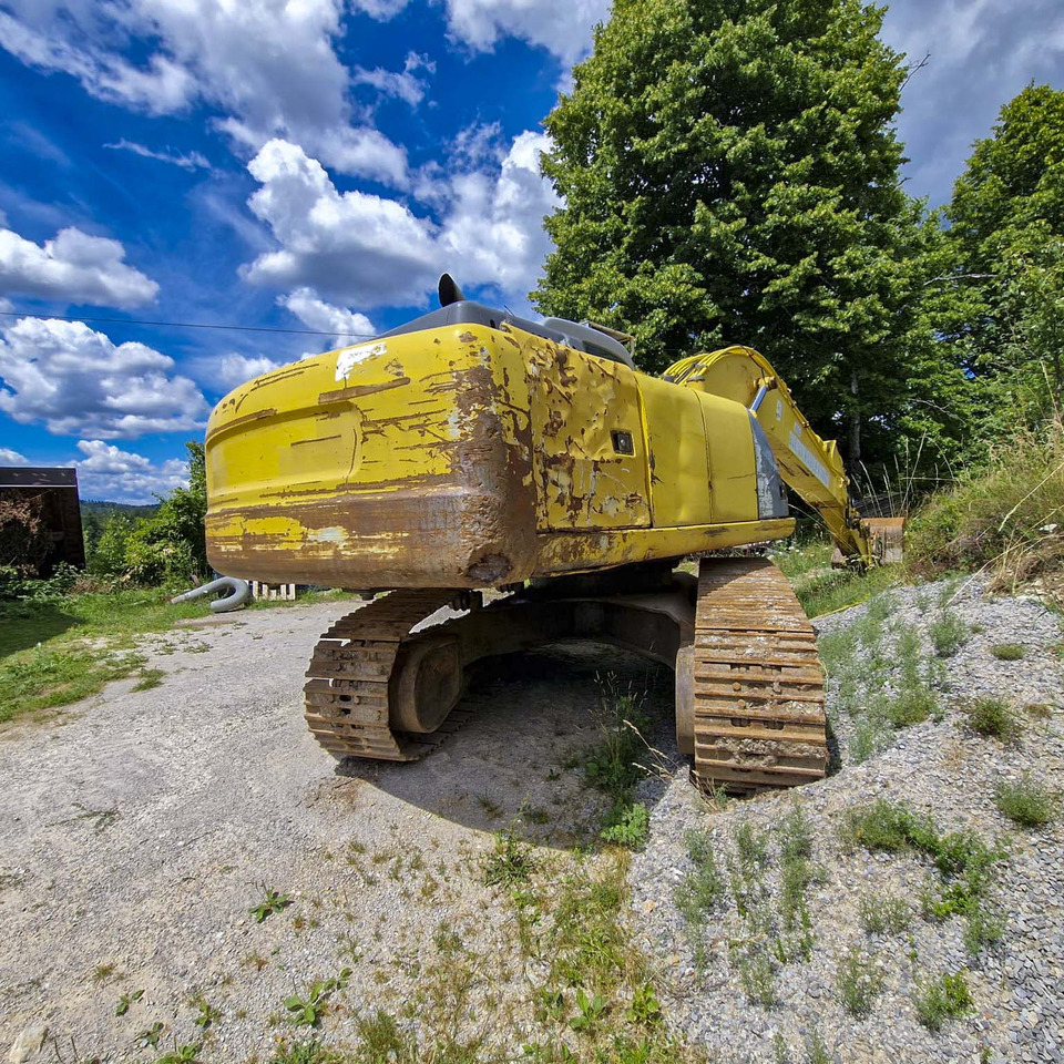 New Holland Kobelco E215 - Pásové rýpadlo: obrázek 5 New Holland Kobelco E215 - Pásové rýpadlo: obrázek 5