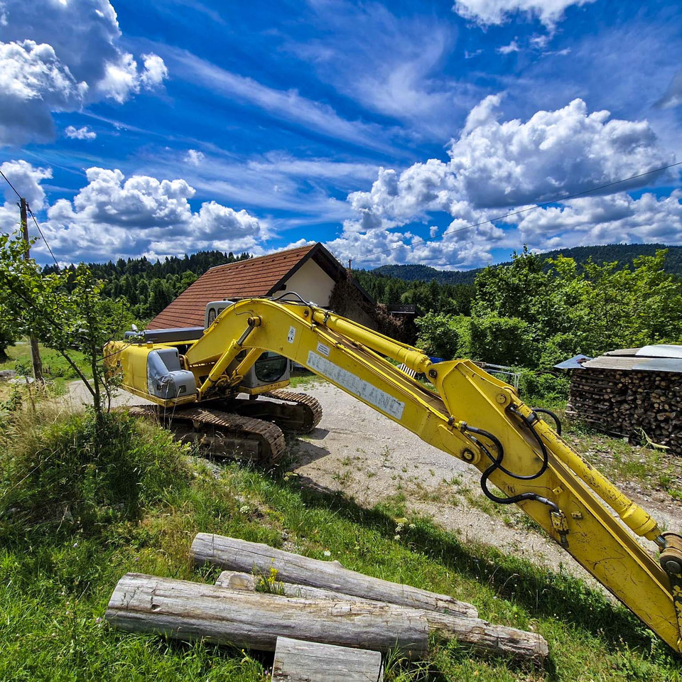 New Holland Kobelco E215 - Pásové rýpadlo: obrázek 3 New Holland Kobelco E215 - Pásové rýpadlo: obrázek 3