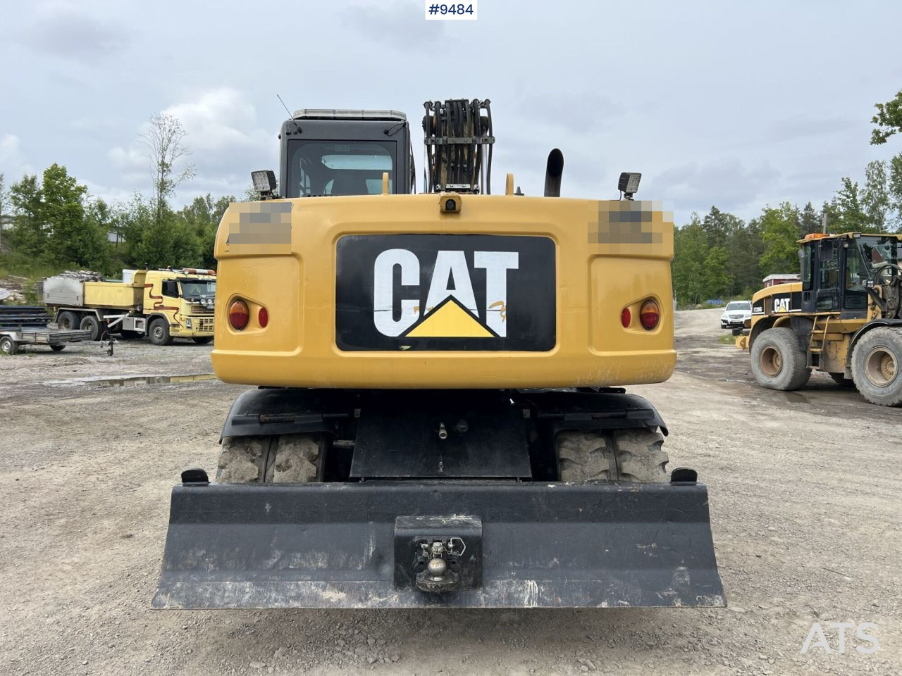 Kolesové rýpadlo CAT M313D with tipping wagon and attachments (VIDEO): obrázek 9