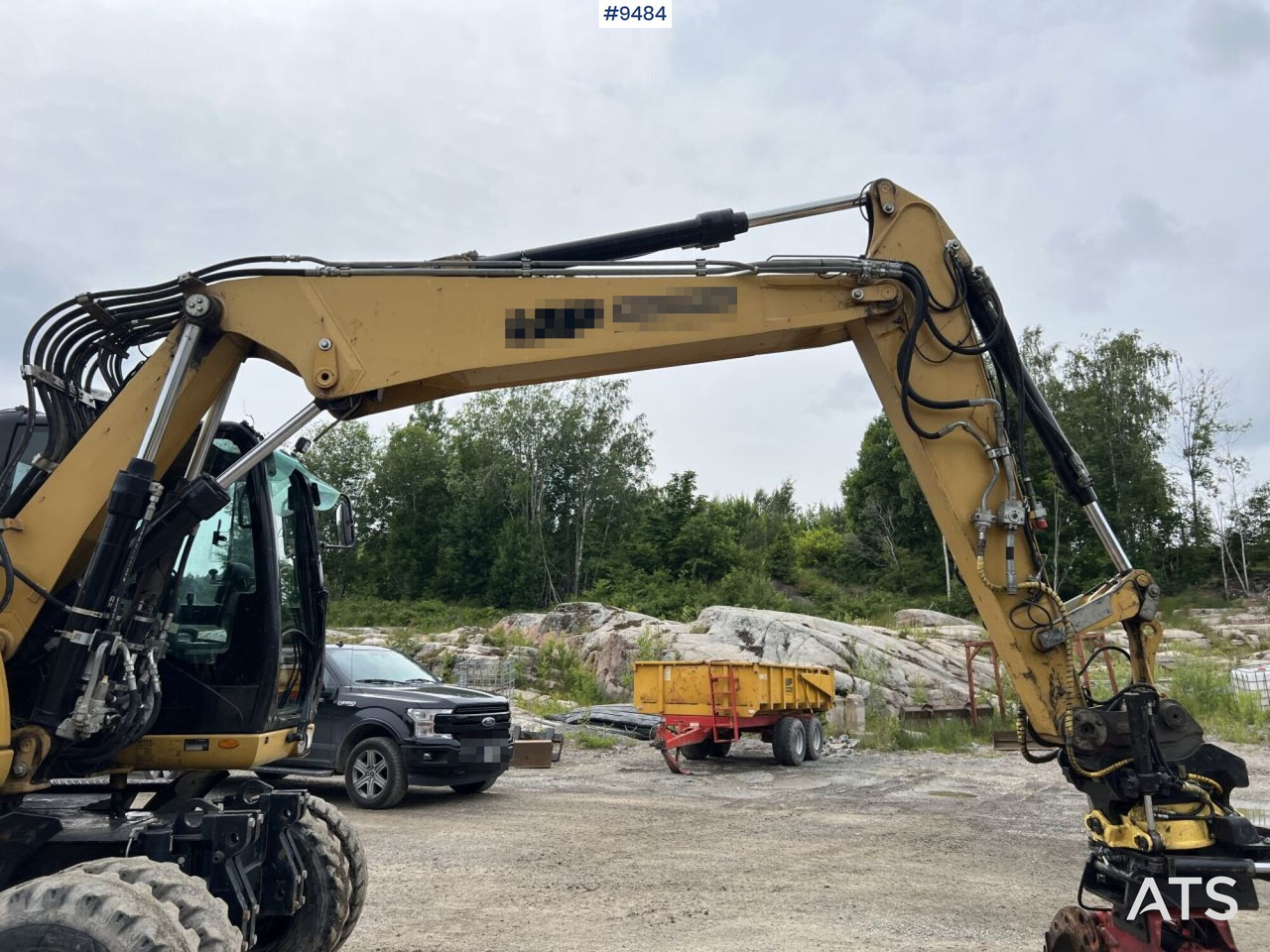 Kolesové rýpadlo CAT M313D with tipping wagon and attachments (VIDEO): obrázek 14
