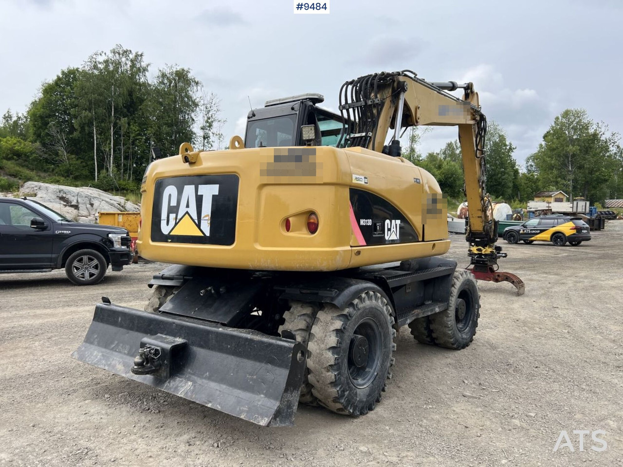 Kolesové rýpadlo CAT M313D with tipping wagon and attachments (VIDEO): obrázek 10