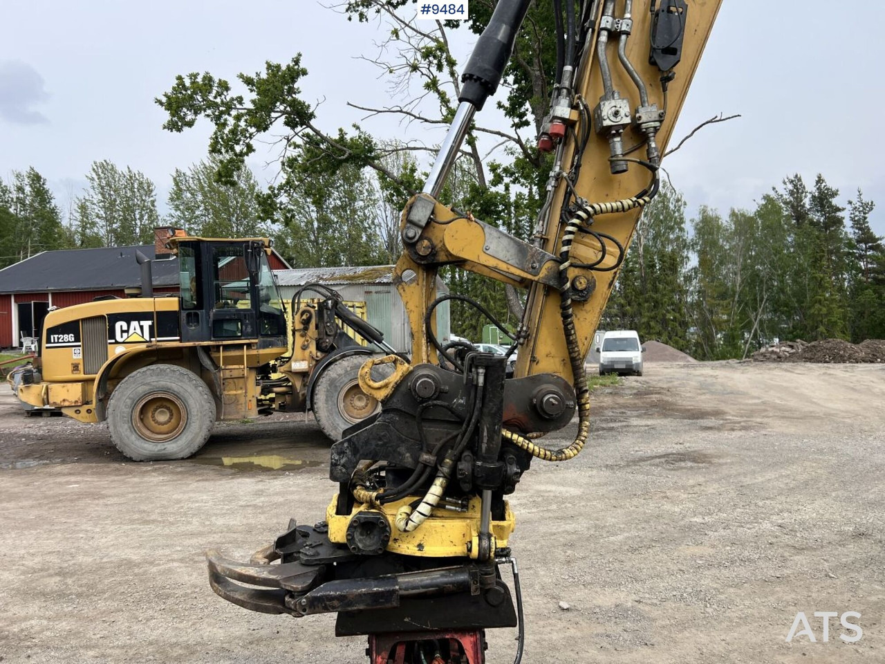 Kolesové rýpadlo CAT M313D with tipping wagon and attachments (VIDEO): obrázek 20