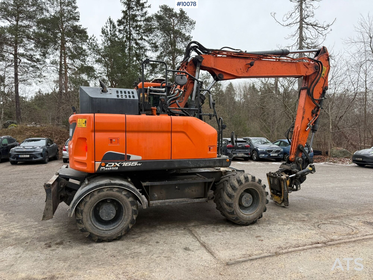 Doosan DX165W-5 Wheeled excavator (VIDEO) - Kolesové rýpadlo: obrázek 4 Doosan DX165W-5 Wheeled excavator (VIDEO) - Kolesové rýpadlo: obrázek 4