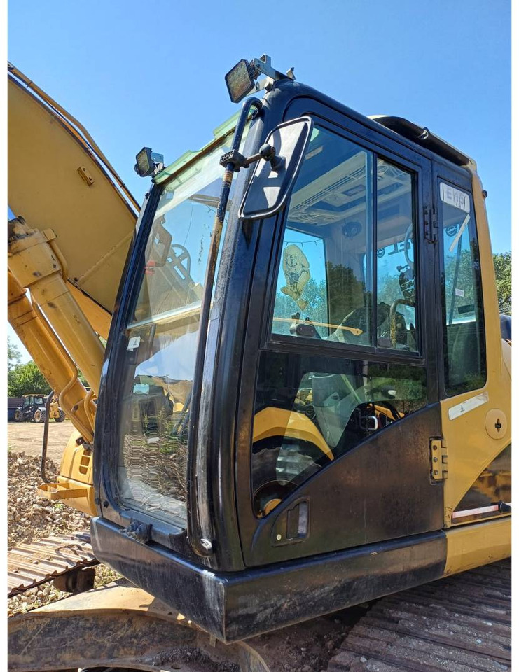 Pásové rýpadlo CAT 318C: obrázek 12