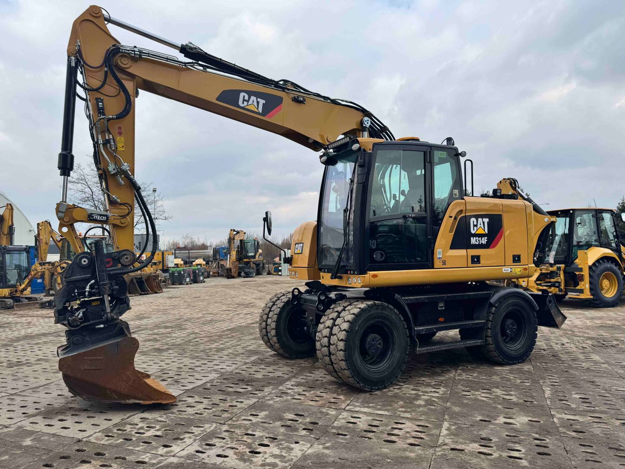 CAT M314F - Kolesové rýpadlo: obrázek 1 CAT M314F - Kolesové rýpadlo: obrázek 1