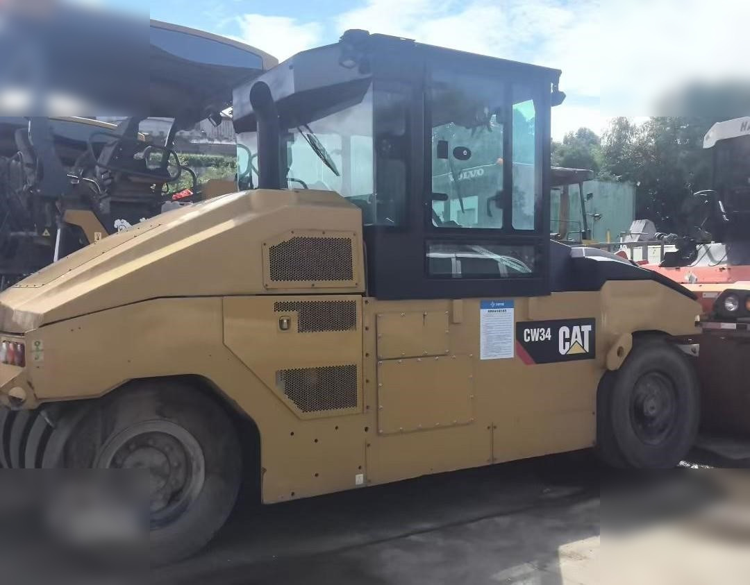 2019 CATERPILLAR CW34 - Pneumatikový válec: obrázek 1 2019 CATERPILLAR CW34 - Pneumatikový válec: obrázek 1