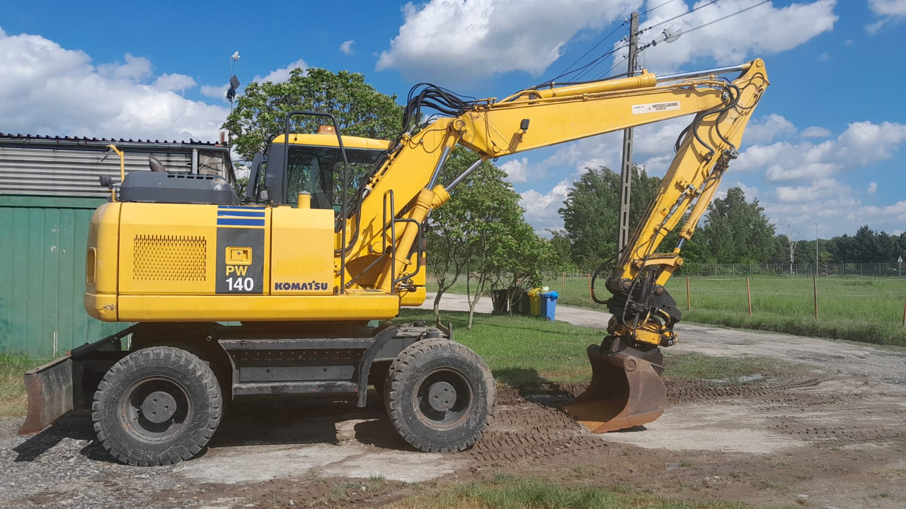 KOMATSU PW 140-7 - Kolesové rýpadlo: obrázek 1 KOMATSU PW 140-7 - Kolesové rýpadlo: obrázek 1