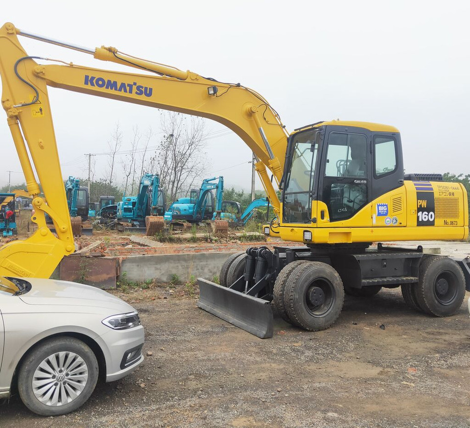 Komatsu PW160 - Kolesové rýpadlo: obrázek 1 Komatsu PW160 - Kolesové rýpadlo: obrázek 1