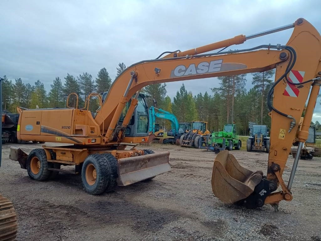 Case WX210 PYÖRITTÄJÄLLÄ - Kolesové rýpadlo: obrázek 5 Case WX210 PYÖRITTÄJÄLLÄ - Kolesové rýpadlo: obrázek 5