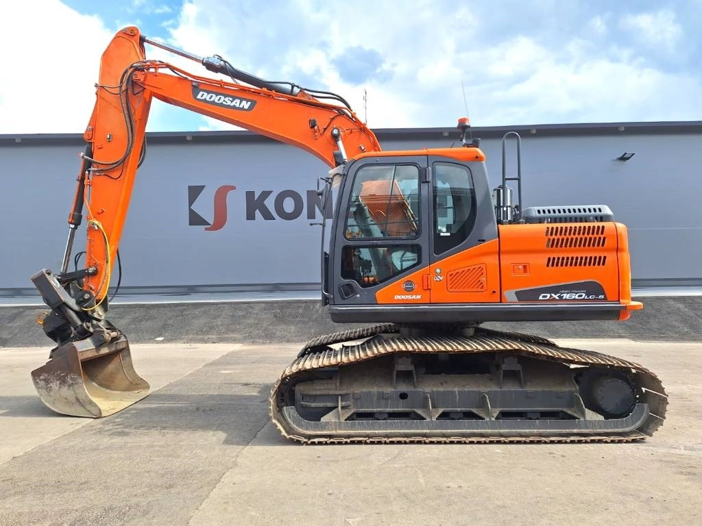 Doosan DX160LCH-5 METSÄMALLI KALLISTAJALLA - Pásové rýpadlo: obrázek 1 Doosan DX160LCH-5 METSÄMALLI KALLISTAJALLA - Pásové rýpadlo: obrázek 1