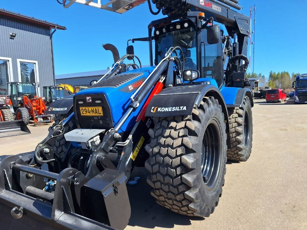Huddig 1260E CABLE, ISO NOSTIN YM. - Rýpadlo-nakladač: obrázek 4 Huddig 1260E CABLE, ISO NOSTIN YM. - Rýpadlo-nakladač: obrázek 4