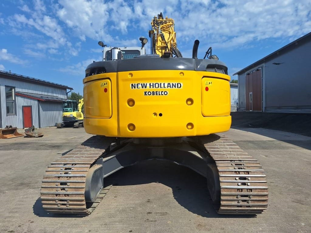 New Holland MYYTY! SOLD! E235BSRLC PYÖRITTÄJÄLLÄ - Pásové rýpadlo: obrázek 3 New Holland MYYTY! SOLD! E235BSRLC PYÖRITTÄJÄLLÄ - Pásové rýpadlo: obrázek 3