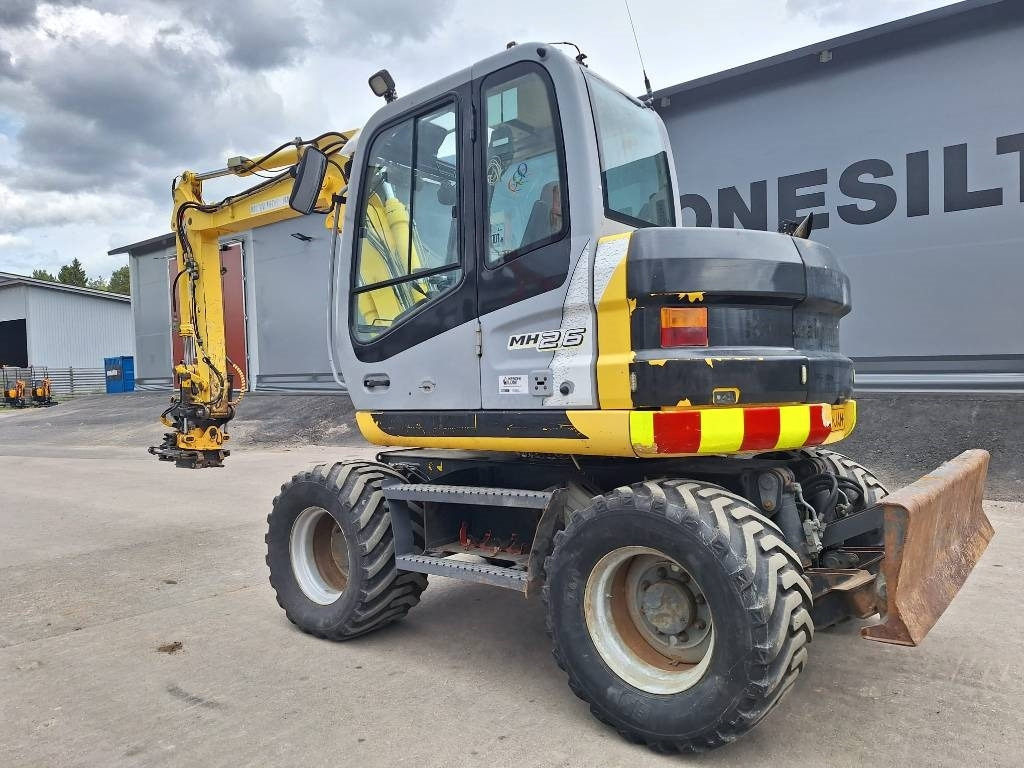 New Holland MYYTY! SOLD! MH2.6 ENGCON PIHDEILLÄ - Kolesové rýpadlo: obrázek 2 New Holland MYYTY! SOLD! MH2.6 ENGCON PIHDEILLÄ - Kolesové rýpadlo: obrázek 2