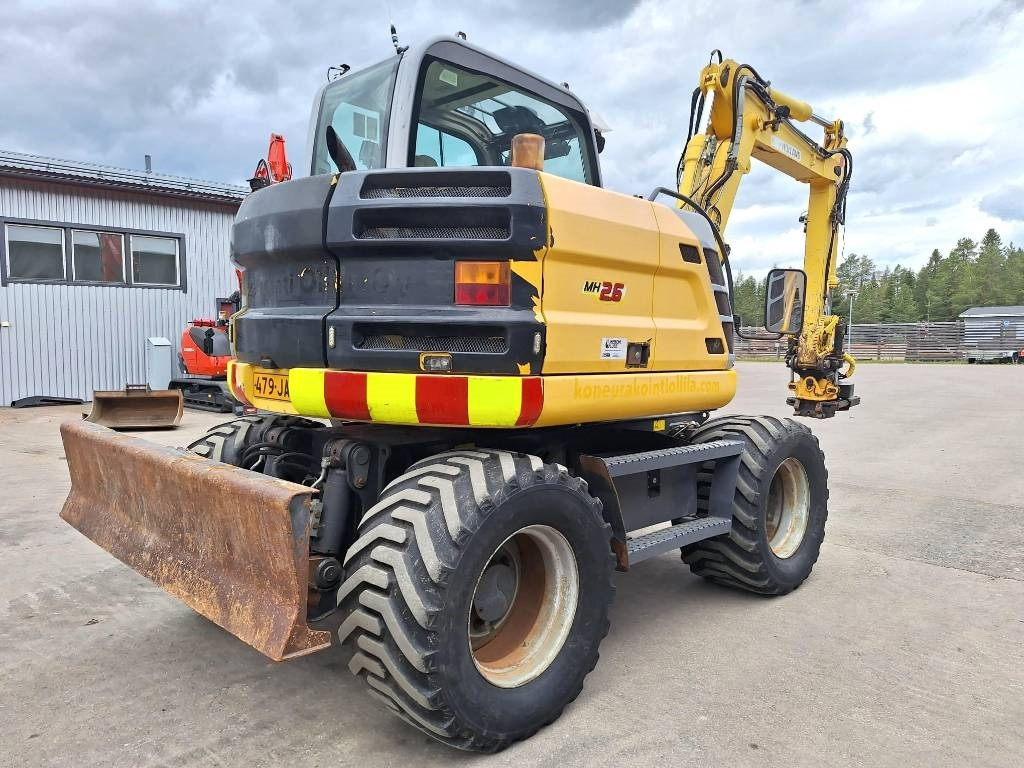 New Holland MYYTY! SOLD! MH2.6 ENGCON PIHDEILLÄ - Kolesové rýpadlo: obrázek 4 New Holland MYYTY! SOLD! MH2.6 ENGCON PIHDEILLÄ - Kolesové rýpadlo: obrázek 4