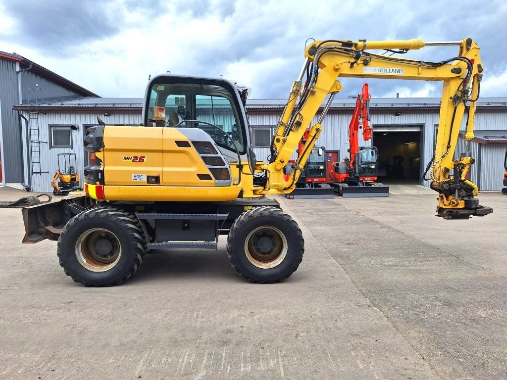 New Holland MYYTY! SOLD! MH2.6 ENGCON PIHDEILLÄ - Kolesové rýpadlo: obrázek 5 New Holland MYYTY! SOLD! MH2.6 ENGCON PIHDEILLÄ - Kolesové rýpadlo: obrázek 5