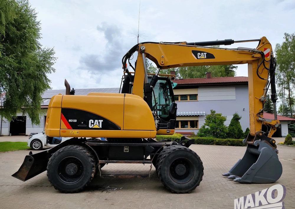 Caterpillar M313D - Kolesové rýpadlo: obrázek 5 Caterpillar M313D - Kolesové rýpadlo: obrázek 5