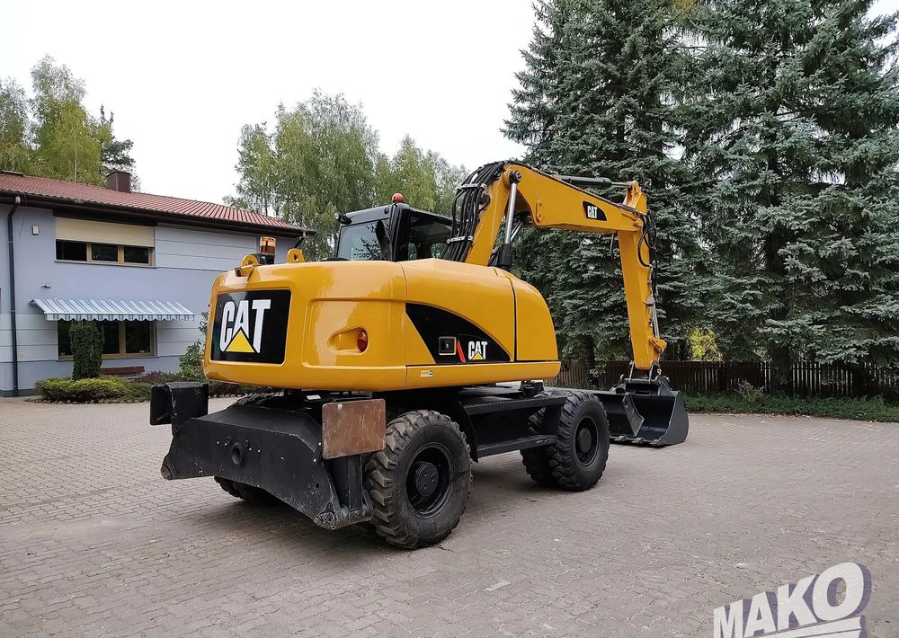 Caterpillar M313D - Kolesové rýpadlo: obrázek 4 Caterpillar M313D - Kolesové rýpadlo: obrázek 4