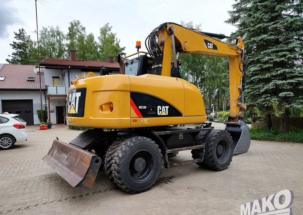 Caterpillar M313D - Kolesové rýpadlo: obrázek 4 Caterpillar M313D - Kolesové rýpadlo: obrázek 4