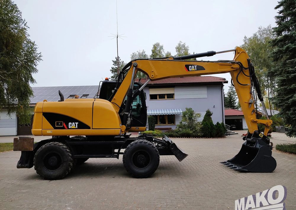 Caterpillar M313D - Kolesové rýpadlo: obrázek 5 Caterpillar M313D - Kolesové rýpadlo: obrázek 5