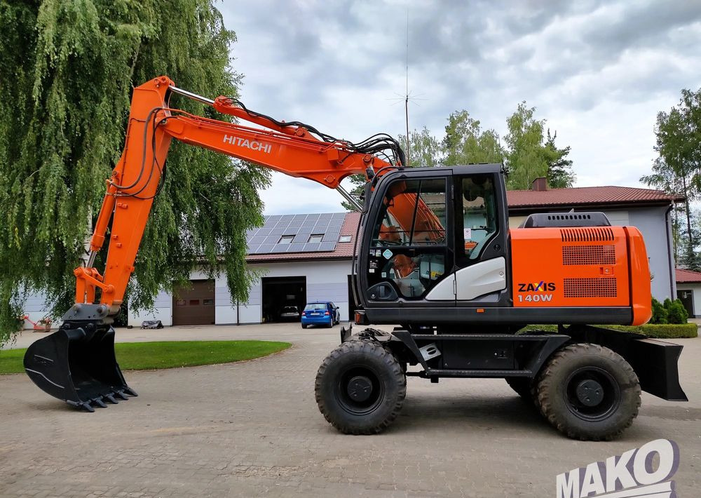 Hitachi ZX 140 - Kolesové rýpadlo: obrázek 1 Hitachi ZX 140 - Kolesové rýpadlo: obrázek 1