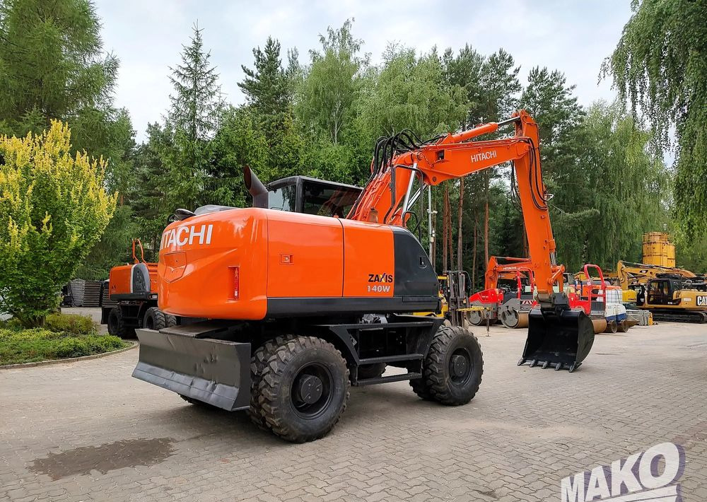 Hitachi ZX 140 - Kolesové rýpadlo: obrázek 4 Hitachi ZX 140 - Kolesové rýpadlo: obrázek 4