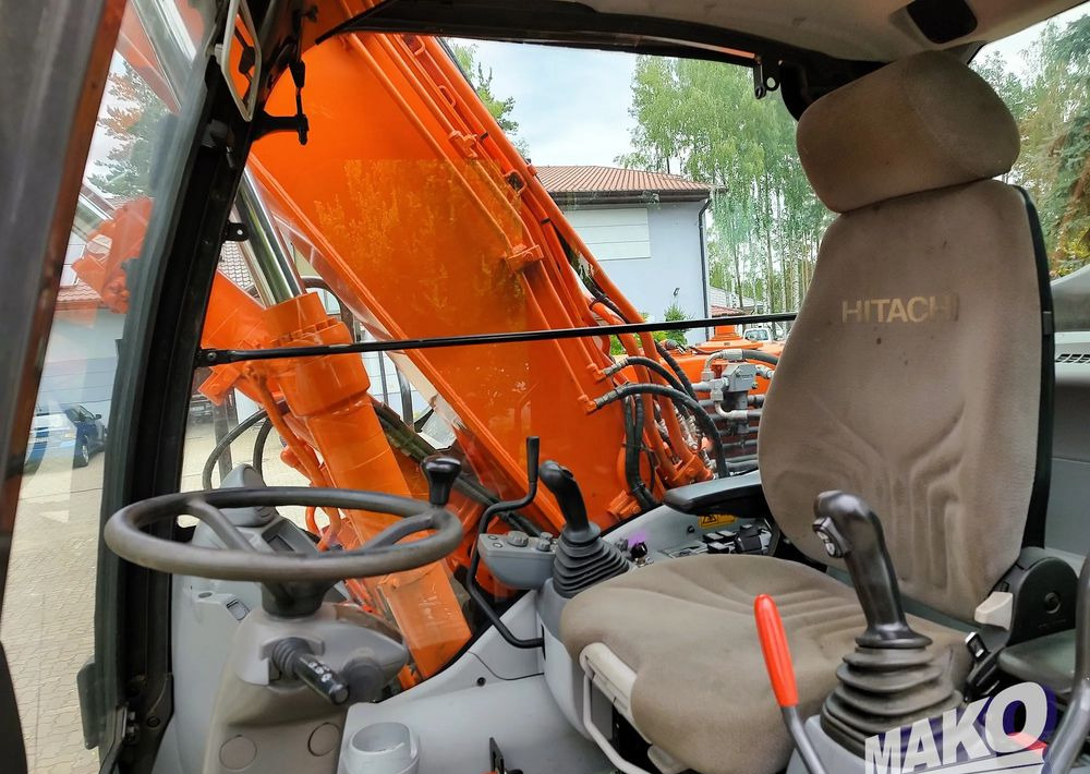Kolesové rýpadlo Hitachi ZX 140: obrázek 11