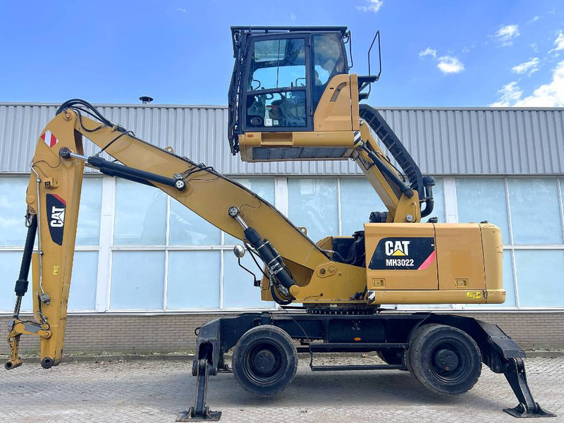 Cat MH 3022 2015 CE - Překládkové rypadlo: obrázek 1 Cat MH 3022 2015 CE - Překládkové rypadlo: obrázek 1