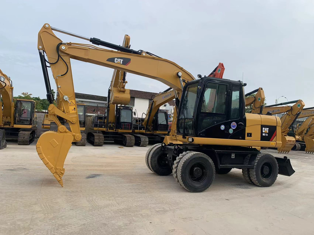 Caterpillar M315D Wheel Excavator Moving by Tires - Kolesové rýpadlo: obrázek 2 Caterpillar M315D Wheel Excavator Moving by Tires - Kolesové rýpadlo: obrázek 2