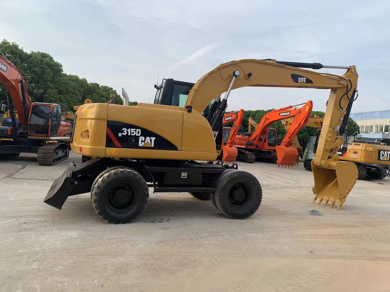 Caterpillar M315D Wheel Excavator Moving by Tires - Kolesové rýpadlo: obrázek 3 Caterpillar M315D Wheel Excavator Moving by Tires - Kolesové rýpadlo: obrázek 3