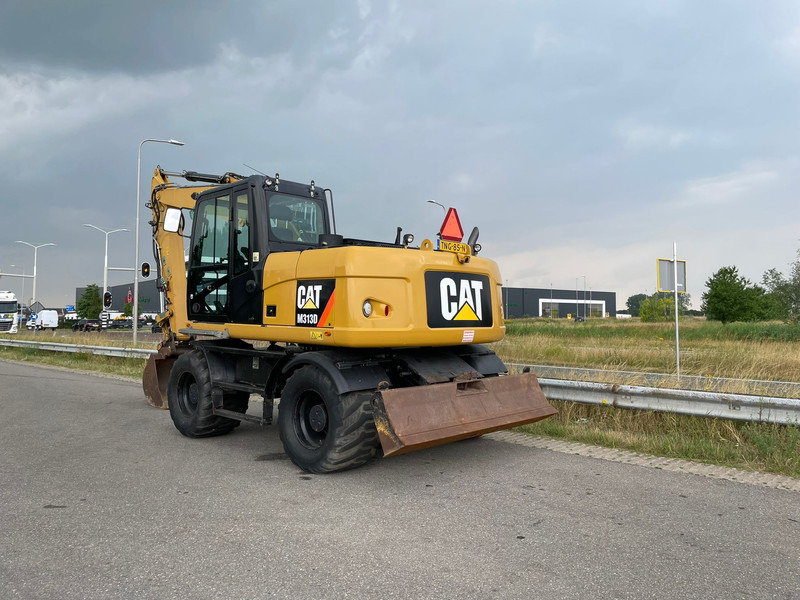Caterpillar M313D - CE - Kolesové rýpadlo: obrázek 1 Caterpillar M313D - CE - Kolesové rýpadlo: obrázek 1