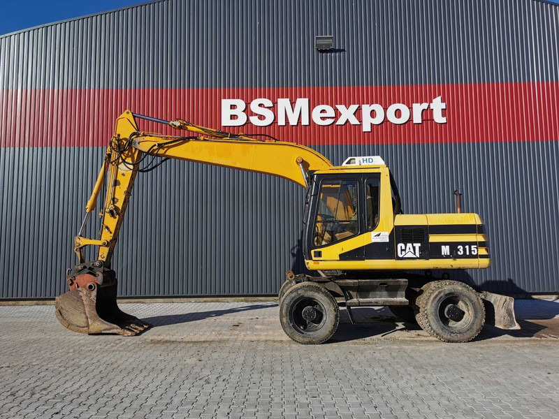 Caterpillar M315 wheel excavator - Kolesové rýpadlo: obrázek 1 Caterpillar M315 wheel excavator - Kolesové rýpadlo: obrázek 1