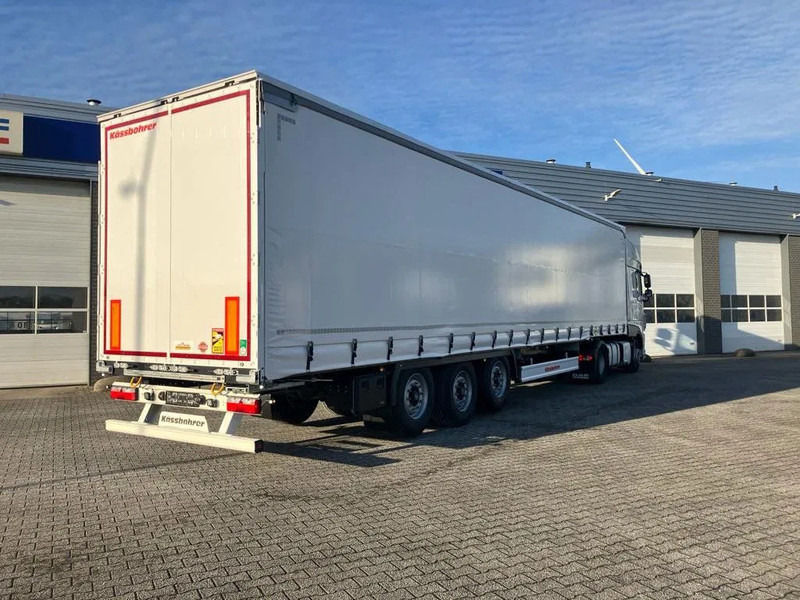 Kässbohrer SCS X / 90 - 12 / 27 Schuifzeilen met twee liftassen en hefdak 500mm - Plachtový návěs: obrázek 5 Kässbohrer SCS X / 90 - 12 / 27 Schuifzeilen met twee liftassen en hefdak 500mm - Plachtový návěs: obrázek 5