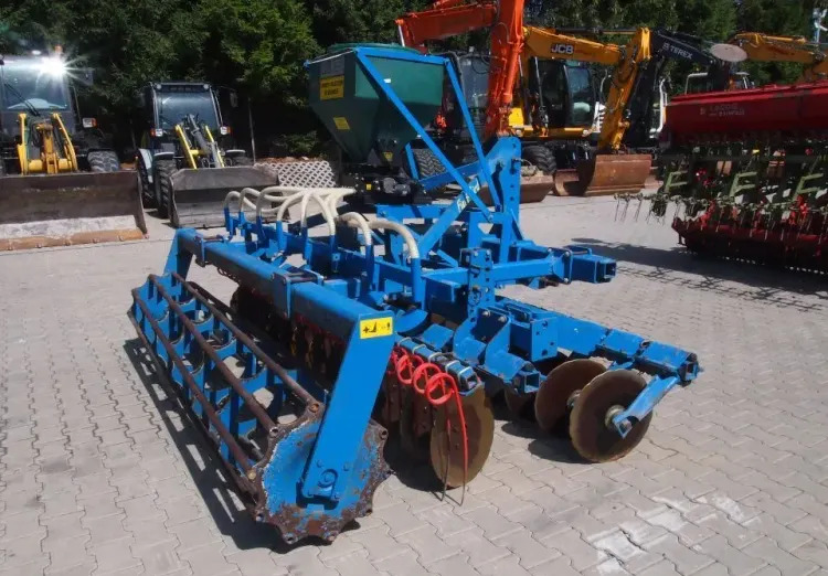 Agregat uprawowo-siewny Rabe Werk 2011 3m brona talerzowa z siewnikiem do poplonów - Secí kombinace: obrázek 5 Agregat uprawowo-siewny Rabe Werk 2011 3m brona talerzowa z siewnikiem do poplonów - Secí kombinace: obrázek 5