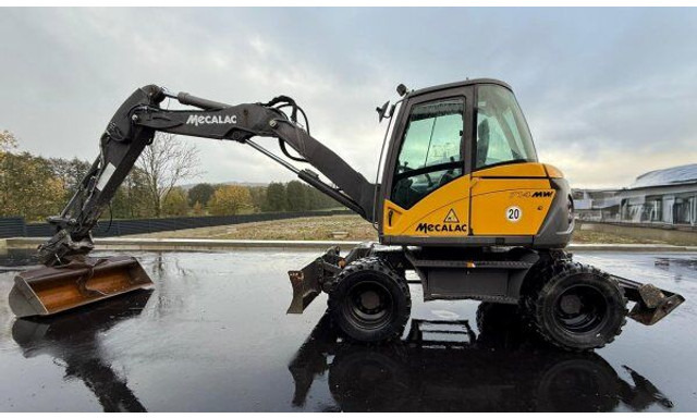 Mecalac 714 MW - Kolesové rýpadlo: obrázek 1 Mecalac 714 MW - Kolesové rýpadlo: obrázek 1