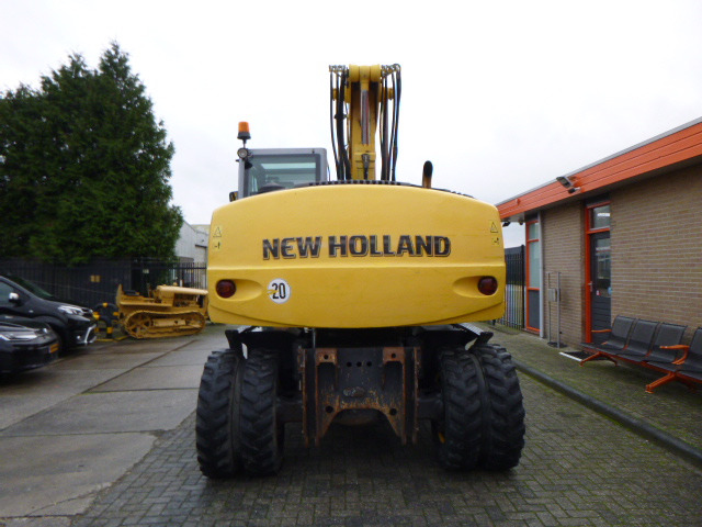 NEW HOLLAND MH PLUS - Kolesové rýpadlo: obrázek 4 NEW HOLLAND MH PLUS - Kolesové rýpadlo: obrázek 4