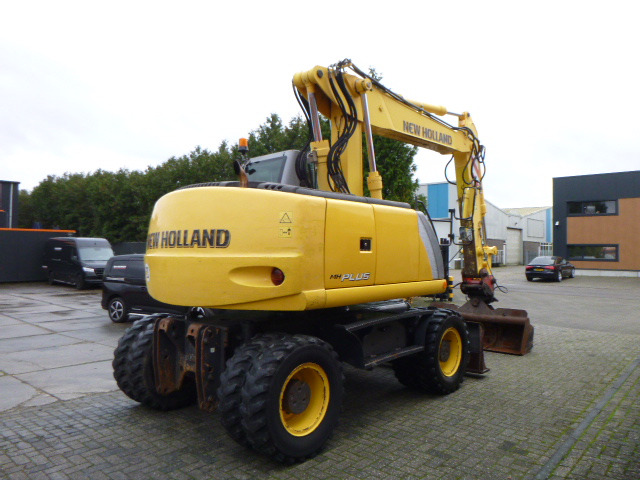 NEW HOLLAND MH PLUS - Kolesové rýpadlo: obrázek 5 NEW HOLLAND MH PLUS - Kolesové rýpadlo: obrázek 5