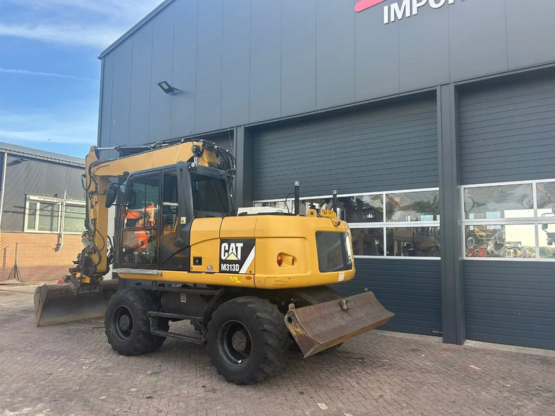 Caterpillar M313D - Kolesové rýpadlo: obrázek 2 Caterpillar M313D - Kolesové rýpadlo: obrázek 2