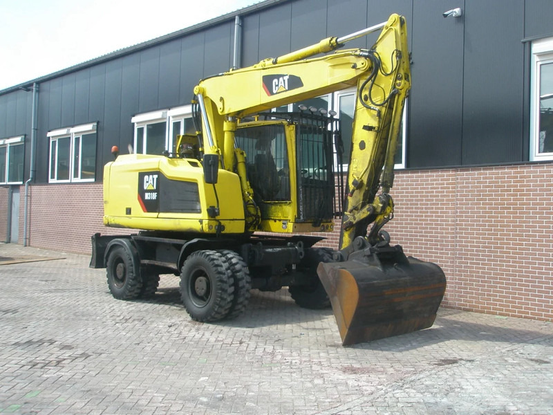 Caterpillar M318F - Kolesové rýpadlo: obrázek 4 Caterpillar M318F - Kolesové rýpadlo: obrázek 4