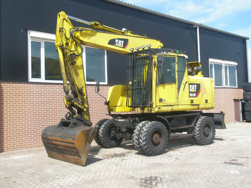 Caterpillar M318F - Kolesové rýpadlo: obrázek 1 Caterpillar M318F - Kolesové rýpadlo: obrázek 1