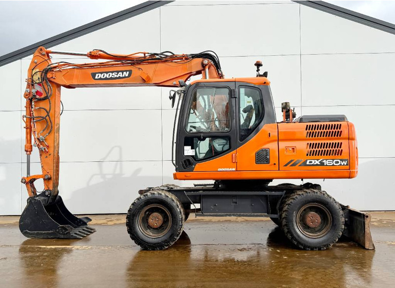 Doosan DX160W-3 - Hammer Lines / Quick Coupler - Kolesové rýpadlo: obrázek 1 Doosan DX160W-3 - Hammer Lines / Quick Coupler - Kolesové rýpadlo: obrázek 1