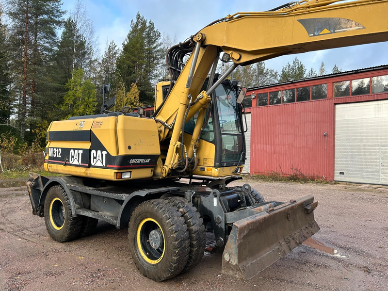 Caterpillar M312 Engcon EC20 tiltrotator - Kolesové rýpadlo: obrázek 4 Caterpillar M312 Engcon EC20 tiltrotator - Kolesové rýpadlo: obrázek 4
