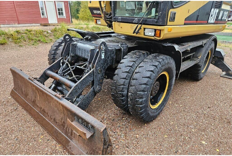 Caterpillar M312 Engcon EC20 tiltrotator - Kolesové rýpadlo: obrázek 4 Caterpillar M312 Engcon EC20 tiltrotator - Kolesové rýpadlo: obrázek 4