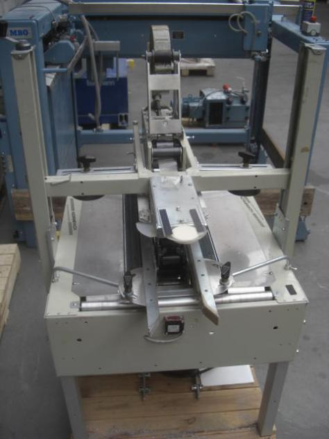 Normpack Tapemat NCG 320 automatic folding carton sealing machine - Balicí stroj: obrázek 4 Normpack Tapemat NCG 320 automatic folding carton sealing machine - Balicí stroj: obrázek 4