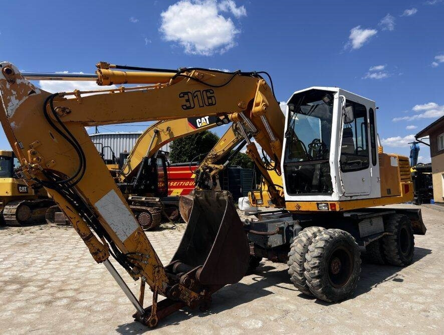 Liebherr A316 - Kolesové rýpadlo: obrázek 1 Liebherr A316 - Kolesové rýpadlo: obrázek 1