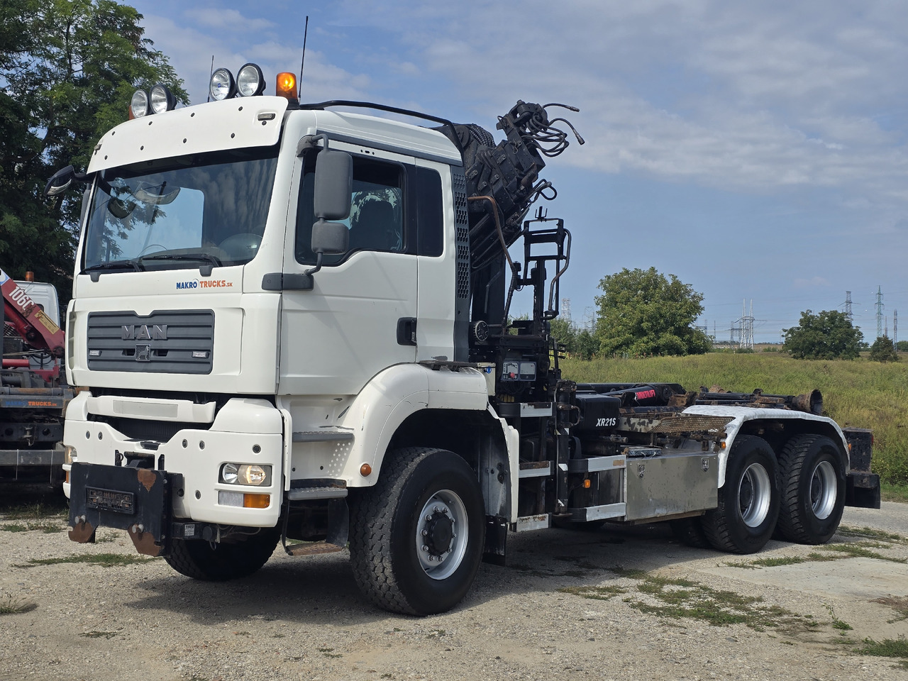 MAN TGA 26.440 6X6 / HOOK SYSTEM / HIAB 166D REMOTE SPECIAL PRICE ONLY THIS YEAR - Hákový nosič kontejnerů, Auto s hydraulickou rukou: obrázek 1 MAN TGA 26.440 6X6 / HOOK SYSTEM / HIAB 166D REMOTE SPECIAL PRICE ONLY THIS YEAR - Hákový nosič kontejnerů, Auto s hydraulickou rukou: obrázek 1