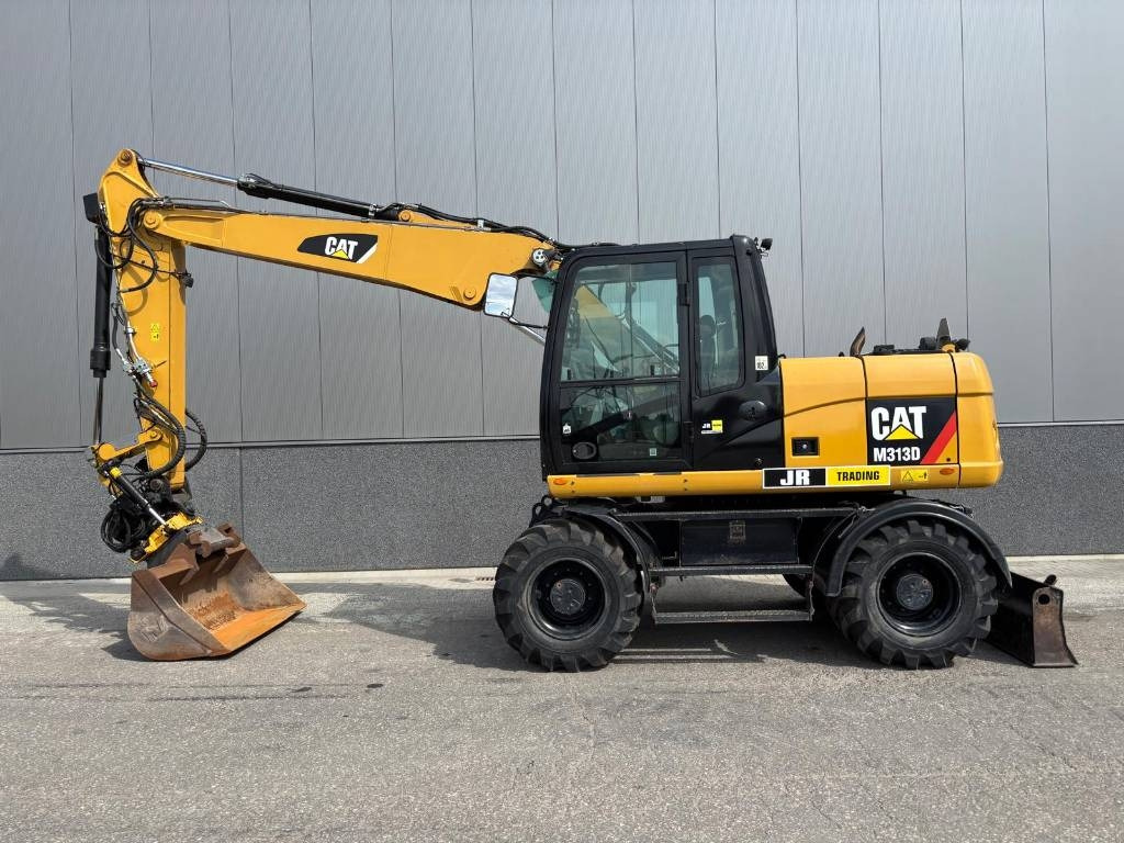 CAT M 313 D - Kolesové rýpadlo: obrázek 1 CAT M 313 D - Kolesové rýpadlo: obrázek 1